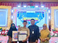 Membanggakan! Reynald Salomo Sitanggang Raih Juara 1 Lomba Ranking 1 OJK